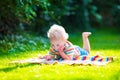 Two kids reading in summer garden Royalty Free Stock Photo