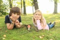 Two kids with red toadstool Royalty Free Stock Photo