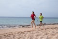 Two kids running together at morning exersises Royalty Free Stock Photo