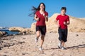 Two kids running together at morning exersises Royalty Free Stock Photo