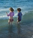 Two kids at sea Royalty Free Stock Photo