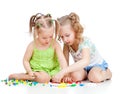 Two kids sisters play together