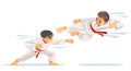 Two kids sparing on karate, makes a high kick.