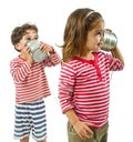 Two kids talking on a tin phone Royalty Free Stock Photo