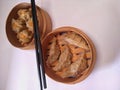 Two kind of dimsum type, Shumay and kuotie or gyoza. Famous traditional food from canton. Royalty Free Stock Photo