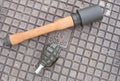 Two kinds of Grenades lying on the ground Royalty Free Stock Photo
