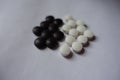 Two kinds of tablets - black bilberry and white vitamin K