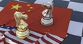 Two knight chess pieces standing on american flag and china flag