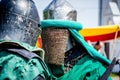 Two knights in a combat armor before the battle close-up_ Royalty Free Stock Photo