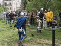 Two knights with halberds fight in the ring at the Purim festival with King Arthur in the city of Jerusalem, Israel