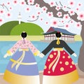 Two Korean girls wearing hanbok at the palace with cherry blossom tree
