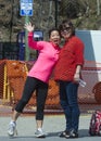 Two Korean women smiling for the camera