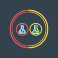 Two laboratory flasks with colored liquids and bubbles in concentric circles beakers Royalty Free Stock Photo