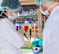 Two laboratory technicians conducting a test. Royalty Free Stock Photo