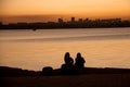 Two Ladies Enjoying the Sunset a the Lake