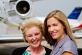 Two ladies ready to board jet Royalty Free Stock Photo