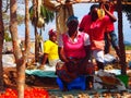 Two ladies selling vegetables at a roadside stall. Location Angola Africa
