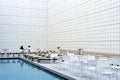 Two Ladies Are Sitting And Talking Public Swimming Pool