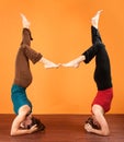 Two Ladies in Yoga Head Stands