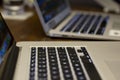 Two Laptops on a Wooden Table Royalty Free Stock Photo