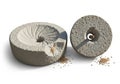 Two large, circular millstones made of rough, textured stone are displayed. One is flat, Royalty Free Stock Photo