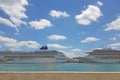 Two large cruise ships in the port in summer weather Royalty Free Stock Photo