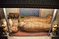 Two large Egyptian sarcophagi and a smaller one with many other objects in a techa inside a room of Villa Stibbert, in Florence.