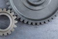 Two Large Interlocking Gears on s Steel Sheet