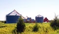 Large Silos and Red Barn in the Midwest Royalty Free Stock Photo