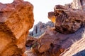 Two large stone from the red rocks form an arch and pass to Charyn canyon. Kazakhstan