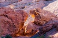 Two large stone from the red rocks form an arch and pass to Charyn canyon. Kazakhstan Royalty Free Stock Photo