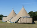 Two large tepees set up for event on farmland Royalty Free Stock Photo