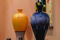 Two large vases with a narrow neck. Vase yellow and blue