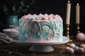 two-layer cake, frosted with swirls of pastel pink and blue icing
