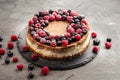Two-layer cheesecake decorated with berries