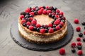 Two-layer cheesecake decorated with berries