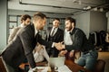 Two leaders shaking hands in office Royalty Free Stock Photo