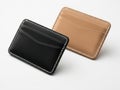 Two leather card holders in black and brown isolated on white background Royalty Free Stock Photo