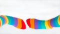 Two left feet wearing rainbow flag socks. Visitibility to LGBTQ Royalty Free Stock Photo