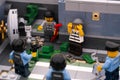 Two Lego robbers arrested by three policemans after they broke door of bank vault and take out money and gold Royalty Free Stock Photo