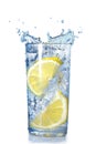 Two lemons fell in a glass Royalty Free Stock Photo