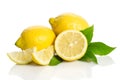 Two lemons and half with leaves Royalty Free Stock Photo