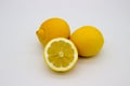 Two lemons and a half of a lemon isolated image on a white background Royalty Free Stock Photo