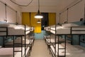 Two-level beds inside dormitory room for students
