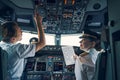 Two licensed pilots getting ready for the take-off Royalty Free Stock Photo