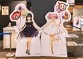 Two life sized standees of the Japanese magical girls anime Puella Magi Madoka Magica.