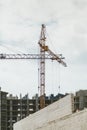 Lifting tower cranes on frame of frame building Royalty Free Stock Photo