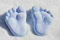Two Light Blue Foot Prints on Granular Surface Royalty Free Stock Photo