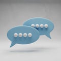 Two Light Blue Speech Bubbles with White Dots on a Textured Gray Background chat conversation Royalty Free Stock Photo