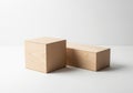 Two light wooden blocks on a white surface Royalty Free Stock Photo